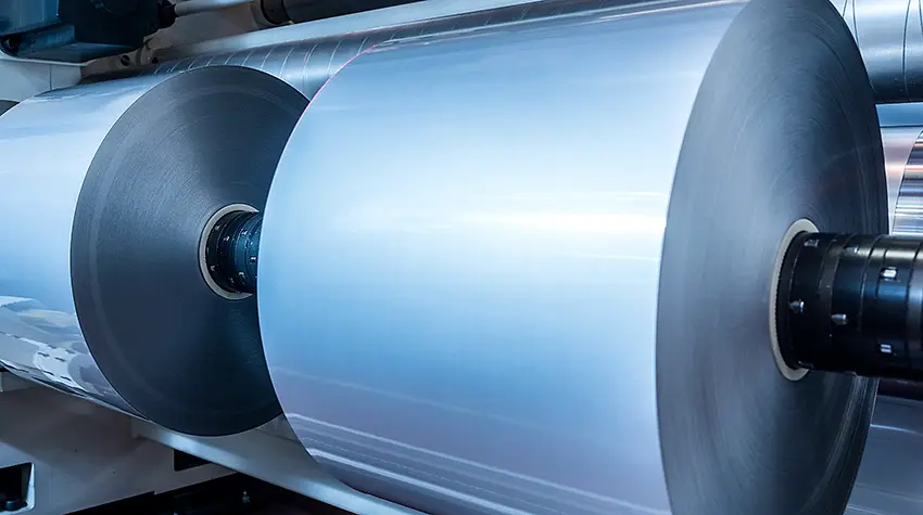 Two aluminium foil coils on the shaft